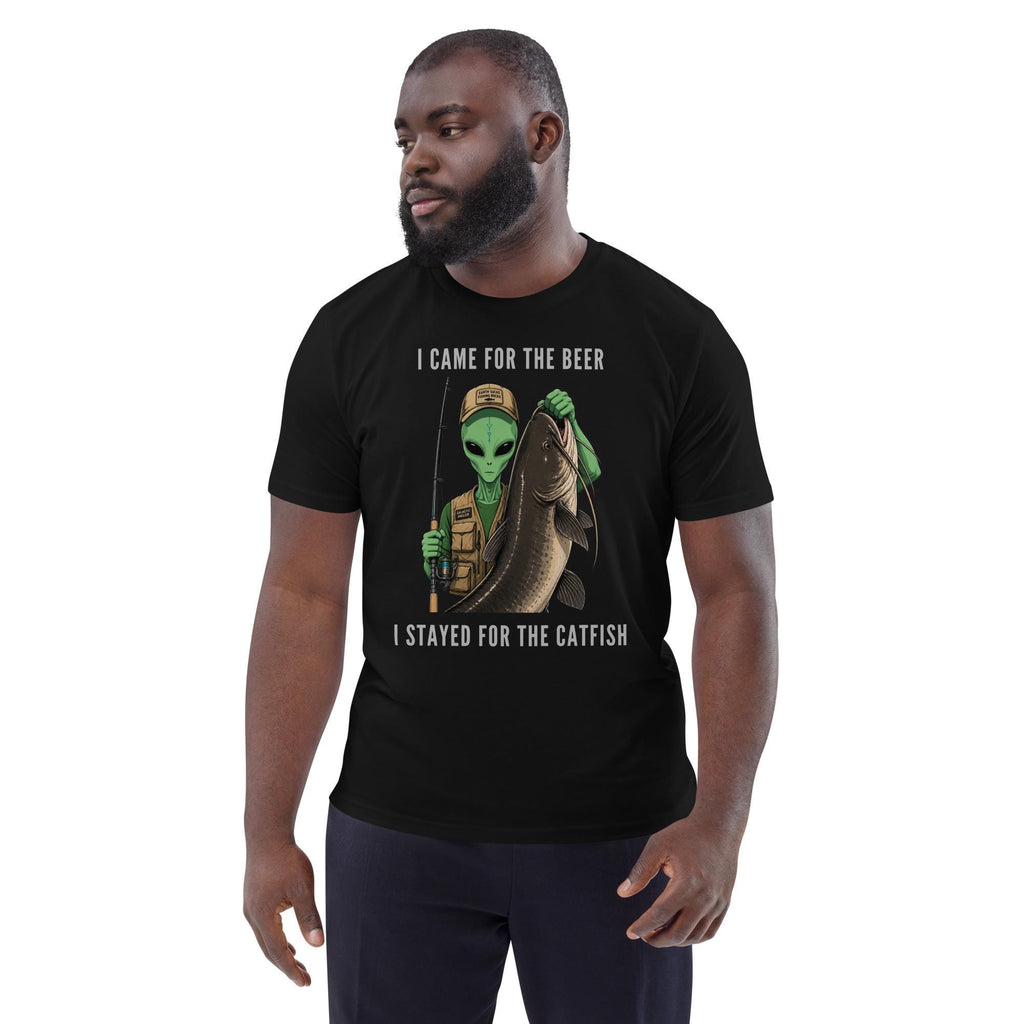 Alien Catfish fishing T-shirt in black, worn by a model with dark trousers on white.
