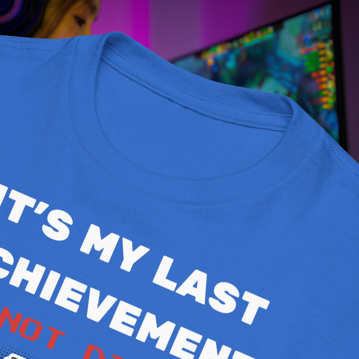 It's My Last Achievement kids' gamer T-shirt in royal blue, close-up of the collar and slogan.