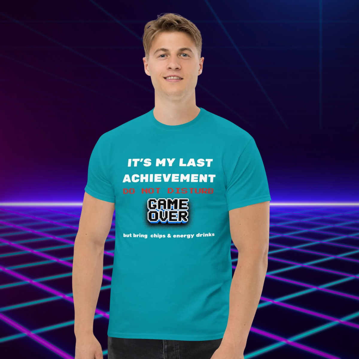 It's My Last Achievement gamer T-shirt in turquoise, worn by a model against a purple neon grid.