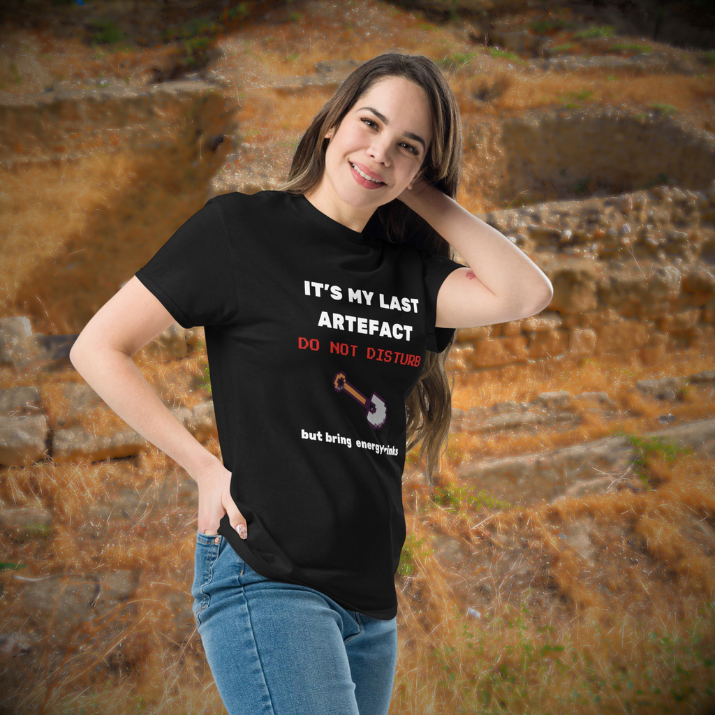 It's My Last Artefact gamer T-shirt in black, worn by a model beside weathered stone steps.