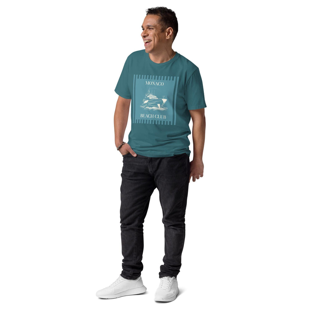 Monaco Beach Club T-shirt in teal, full-length view on a model with black trousers.