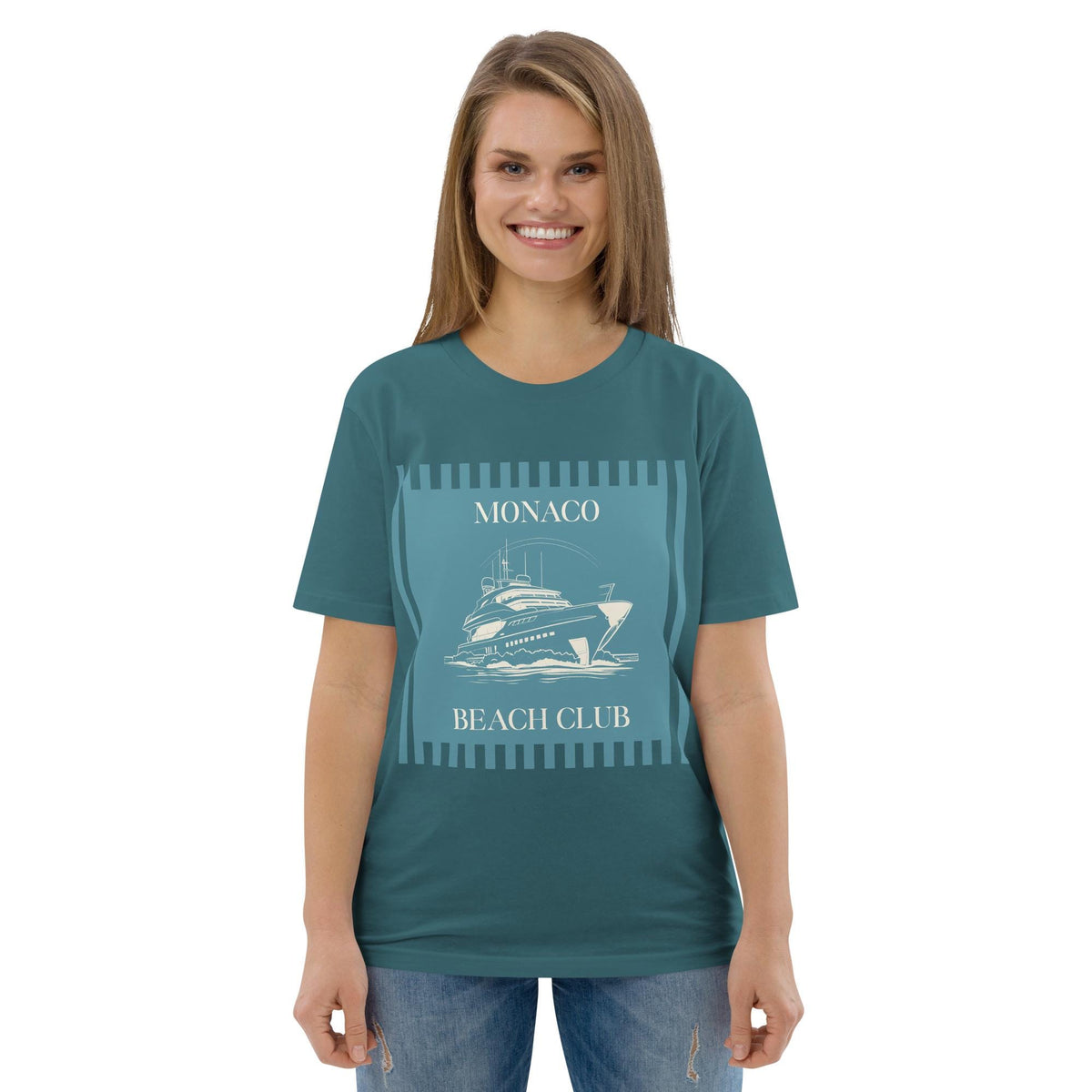 Monaco Beach Club T-shirt in teal, worn by a model with blue jeans, front view.