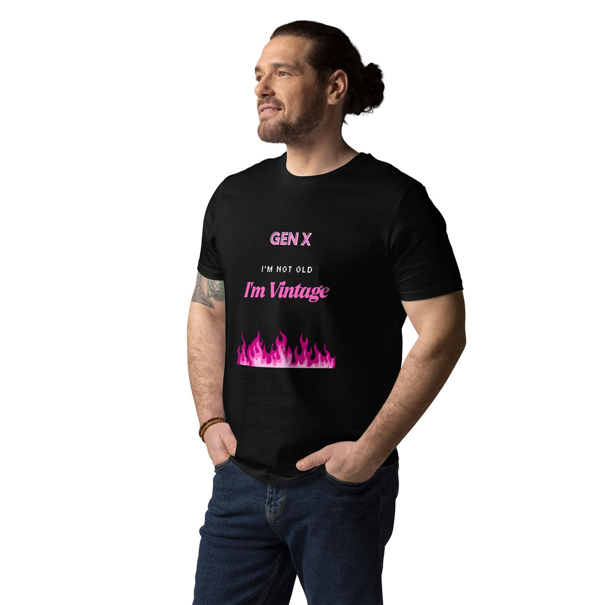 Gen X Pink Flame Vintage T-shirt in black, worn by a model with hands in pockets, three-quarter view.
