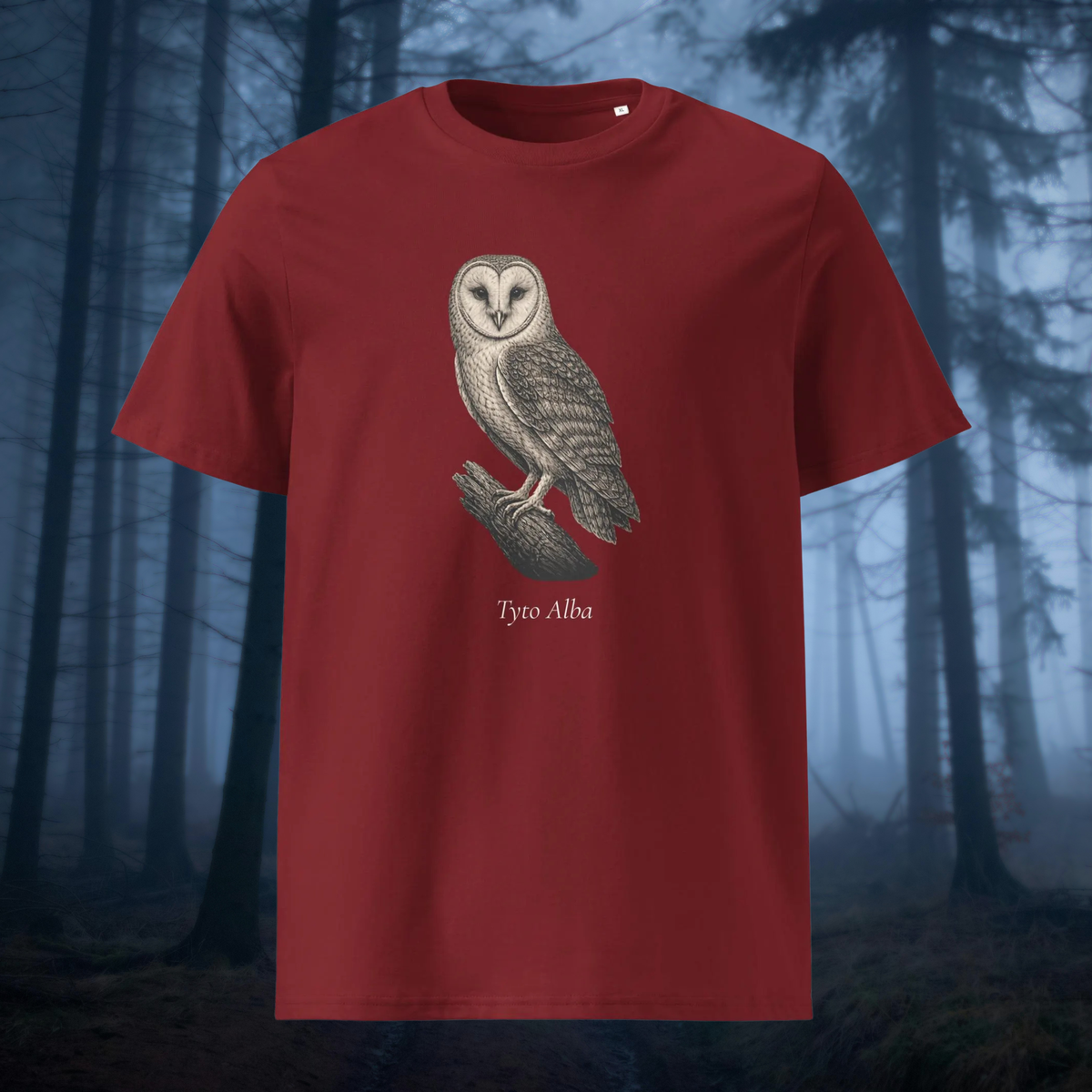 Vintage Barn Owl T-shirt in burgundy, front product view against a misty forest backdrop.