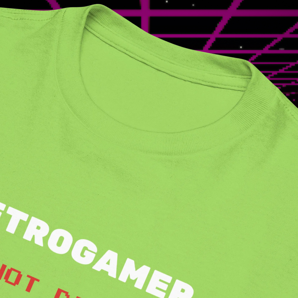 Retrogamer kids' T-shirt in lime green, close-up of the collar and slogan against neon graphics.