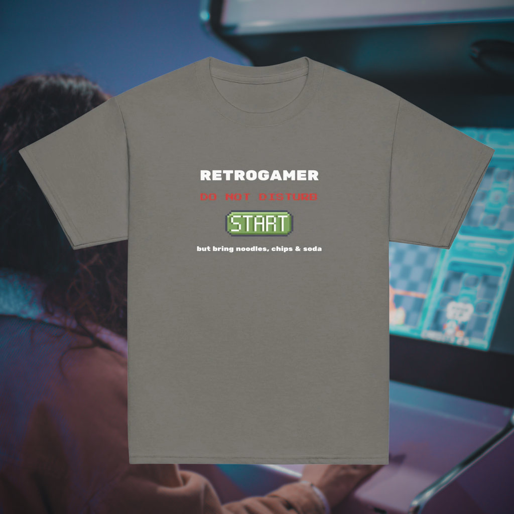 Retrogamer kids' T-shirt in charcoal, front product view against a gaming setup.