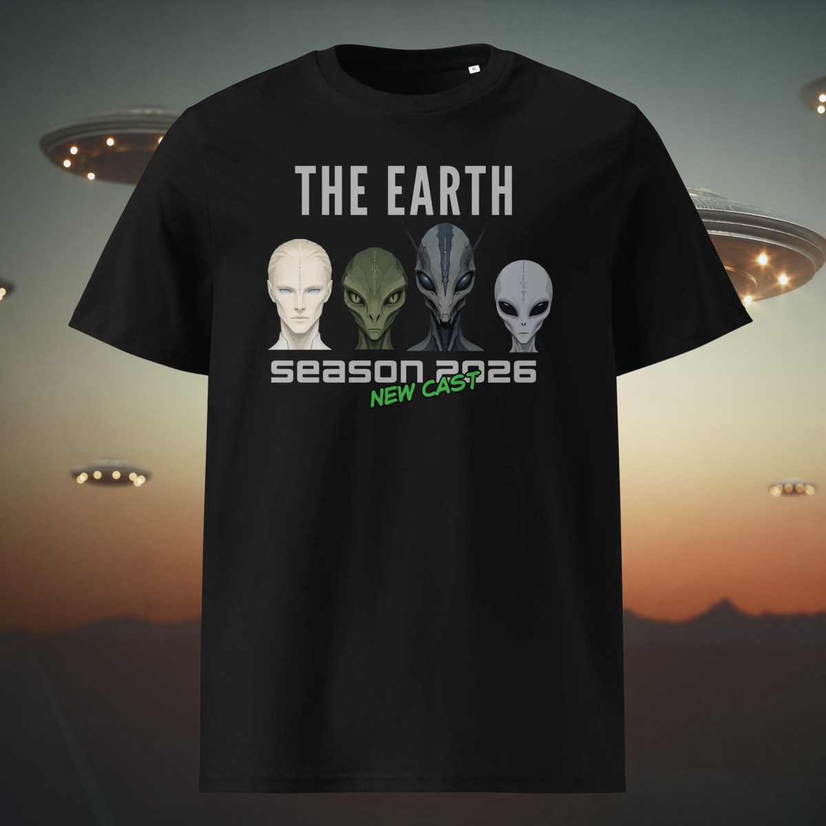 The Earth Season 2026 alien T-shirt in black, front product view showing human and alien faces against a UFO backdrop.