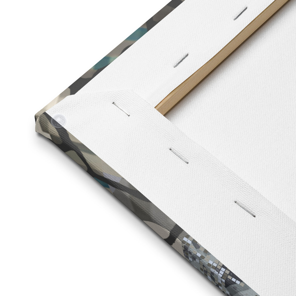 Rear corner of the thin canvas showing the wooden stretcher, staples and printed fabric wrapped around the edge.