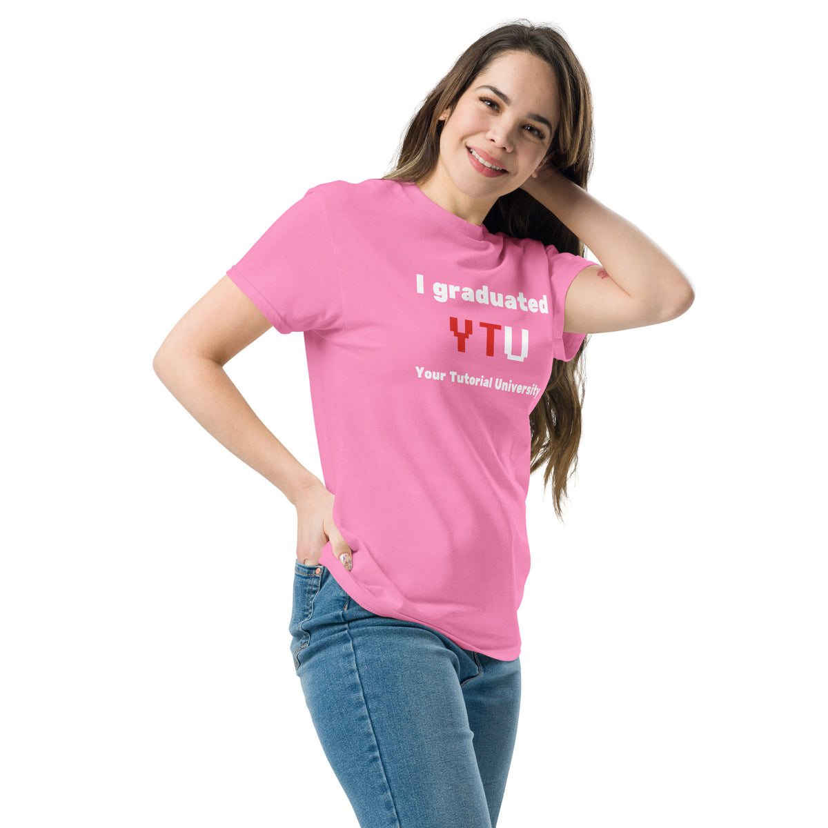 I Graduated YTU T-shirt in pink, worn by a model with one hand raised to the head.
