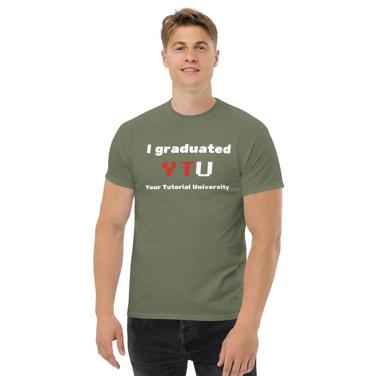 I Graduated YTU T-shirt in military green, worn by a model with hands in pockets on white.